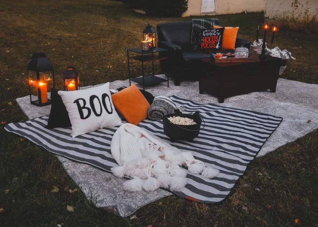 Decorations for an outdoor Halloween movie night